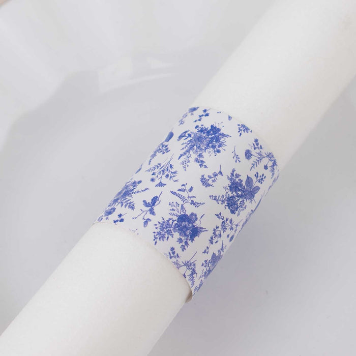 Floral napkin ring holder on a white plate
