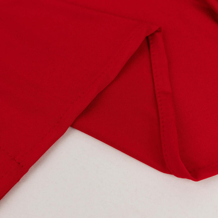 Red fabric showcasing smooth texture and clean edges.