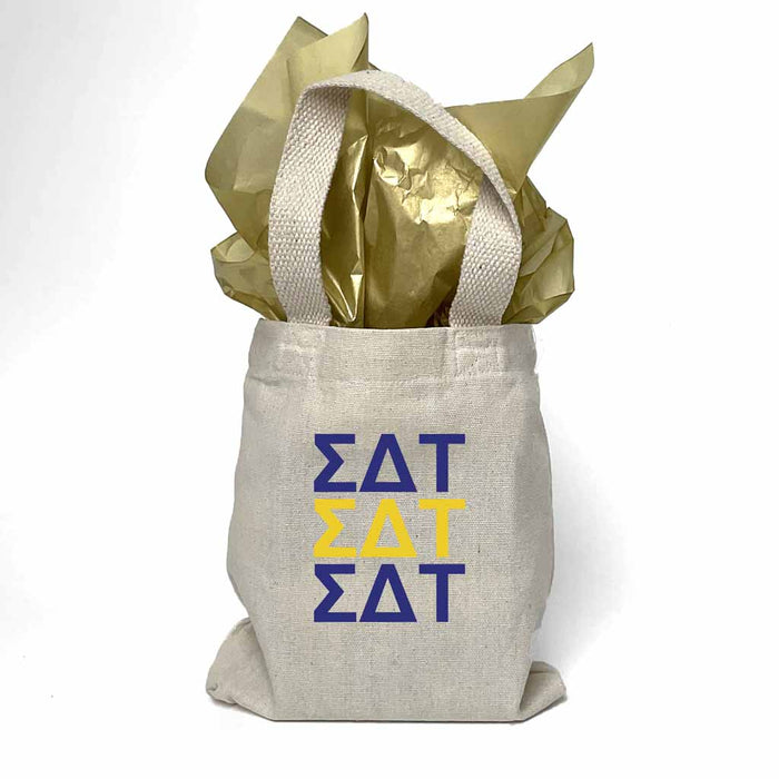 Sorority greek letters printed in sorority colors on natural canvas mini tote gift bag.
