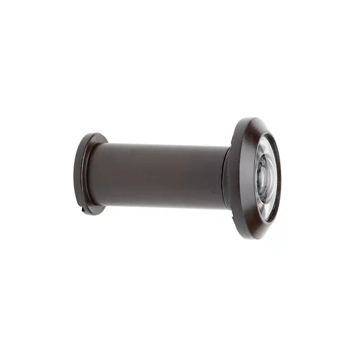 A close-up of a Prima Decorative Hardware bronze door viewer (peephole), made from solid metal with plastic lenses, shown isolated on a white background.