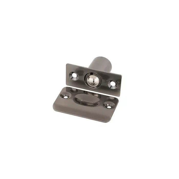The Taymor Industries metal door ball catch features a zinc die-cast body, a rectangular stamped steel strike plate, and a spring-loaded ball to hold doors closed without a latch.