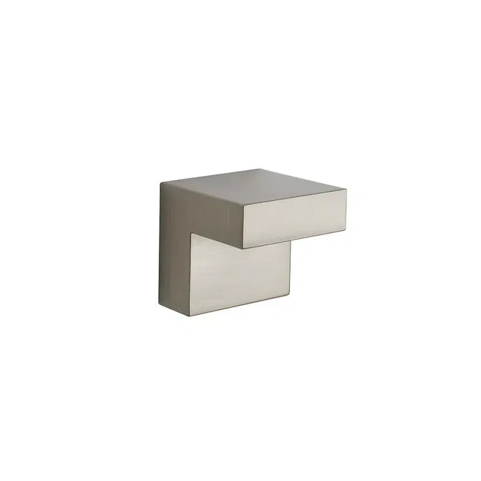The Taymor Industries modern cabinet knob is zinc die-cast with a brushed nickel finish, offset "L" shape, 1-inch wide, and minimalist design. Features clean lines and a break-off screw. Isolated on white background.